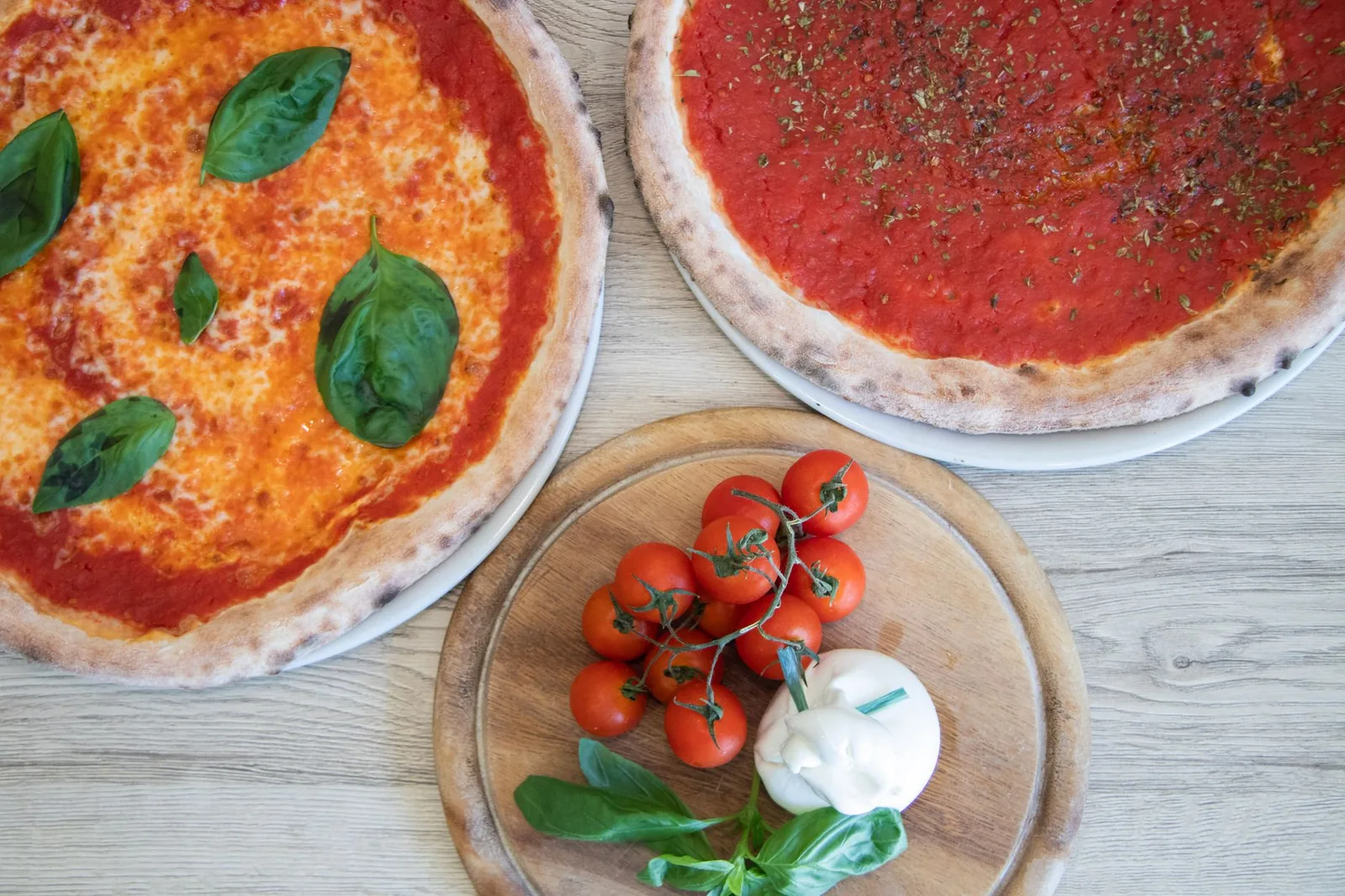 A simple tomato and cheese pizza