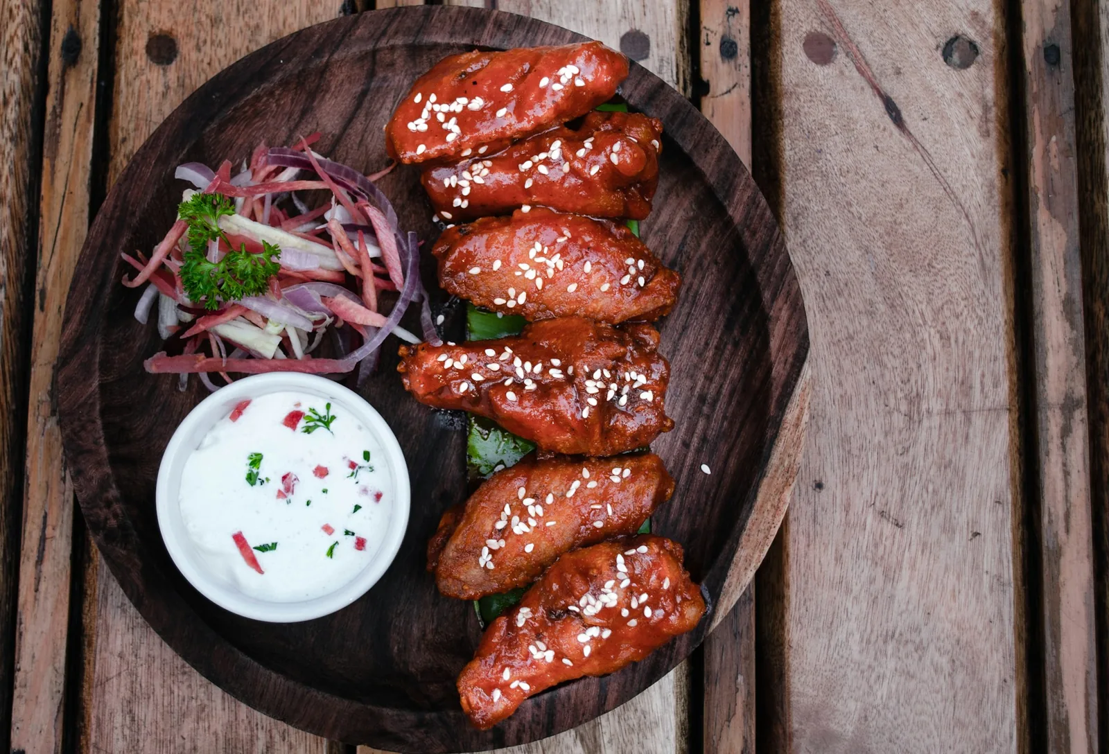 Chicken wings spread across a table