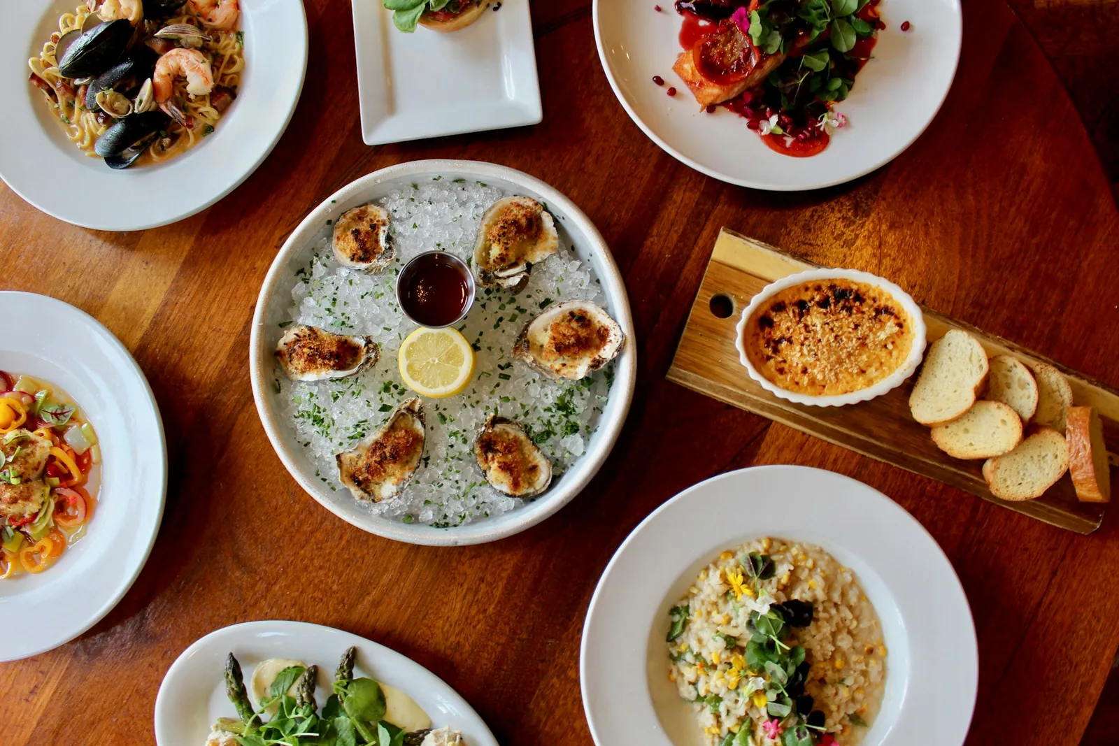 A table spread with shared dishes