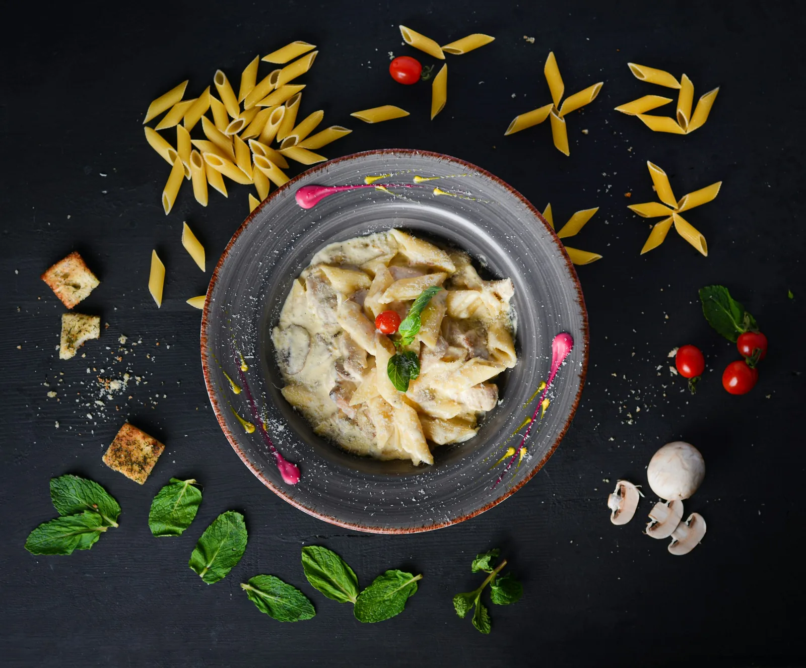 A pasta dish on a dark background