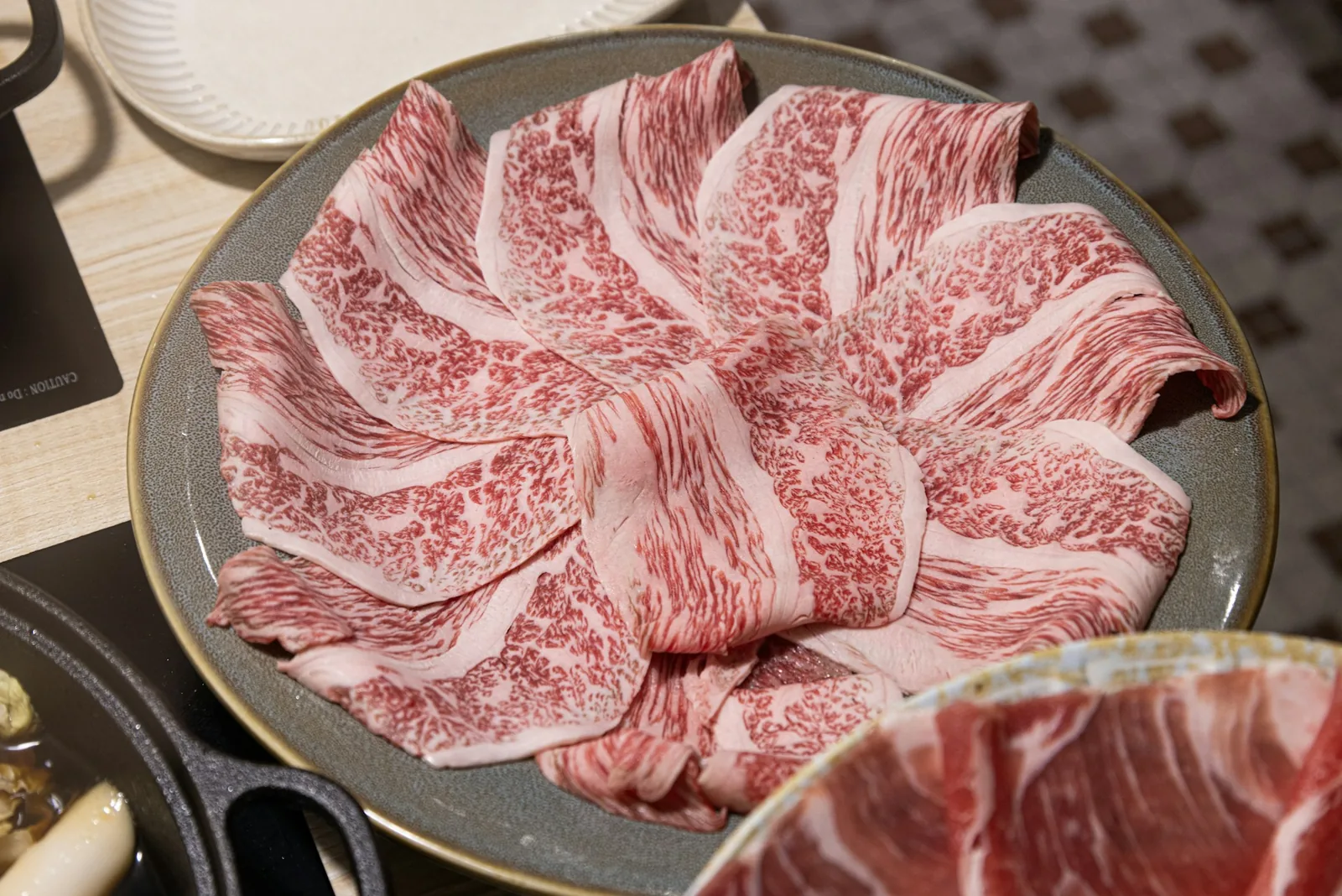 Thinly sliced raw beef