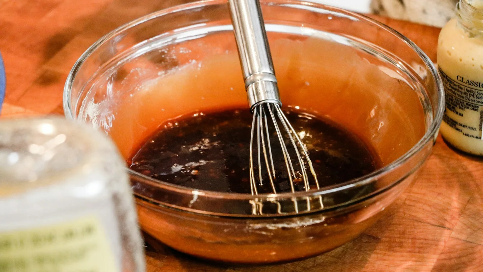 A bowl of dark barbecue glaze