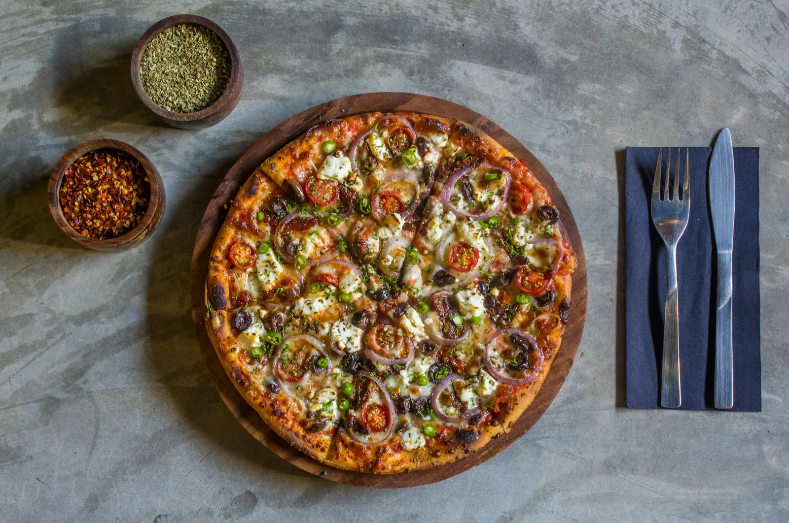 A topped pizza photographed from above