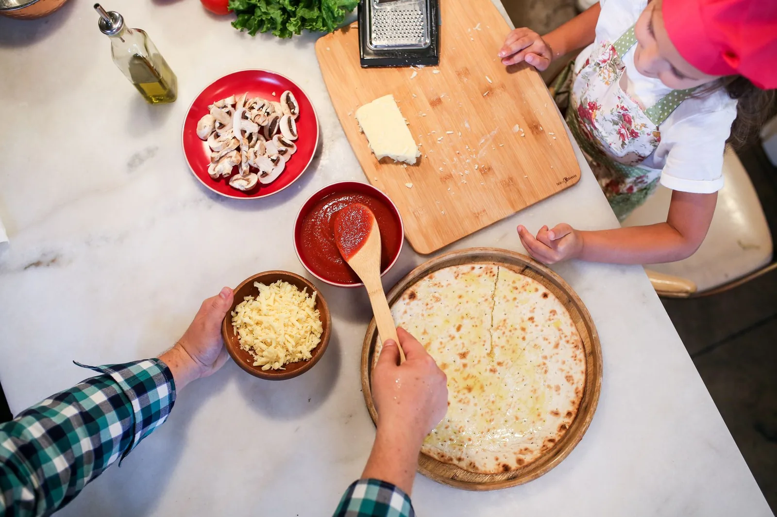 Pizza being prepared, from above