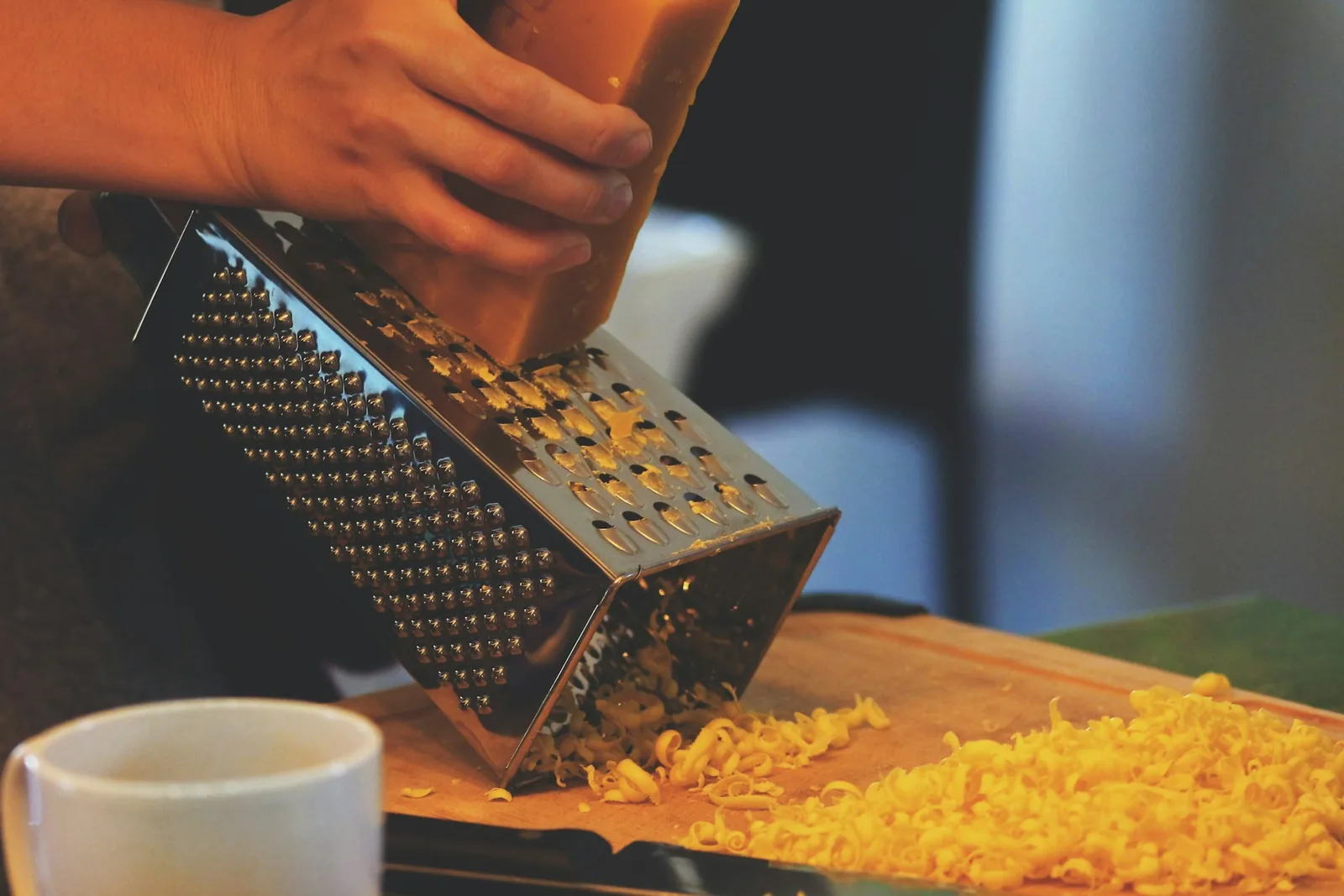 Grated cheese scattered by hand