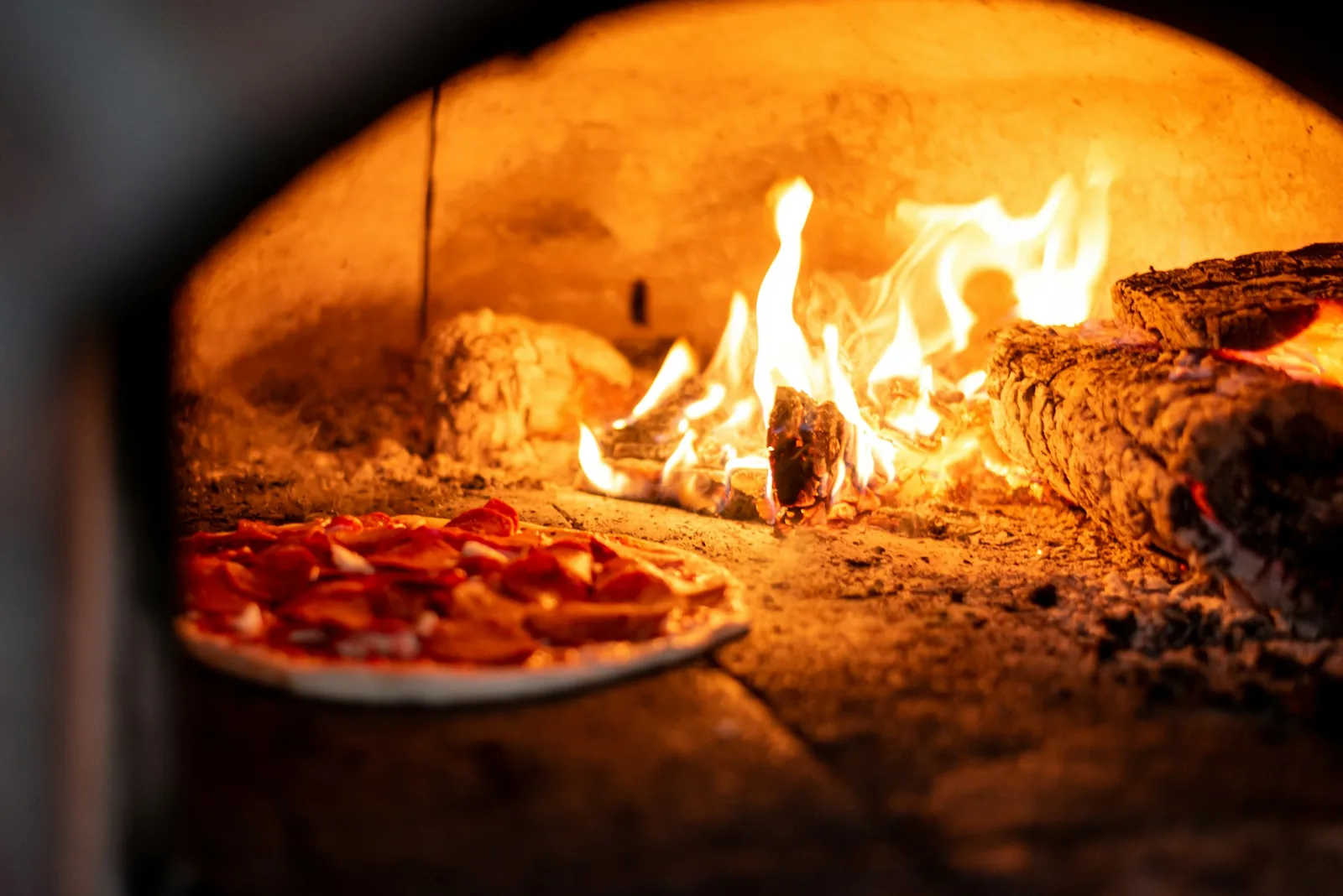 A finished pizza in warm light