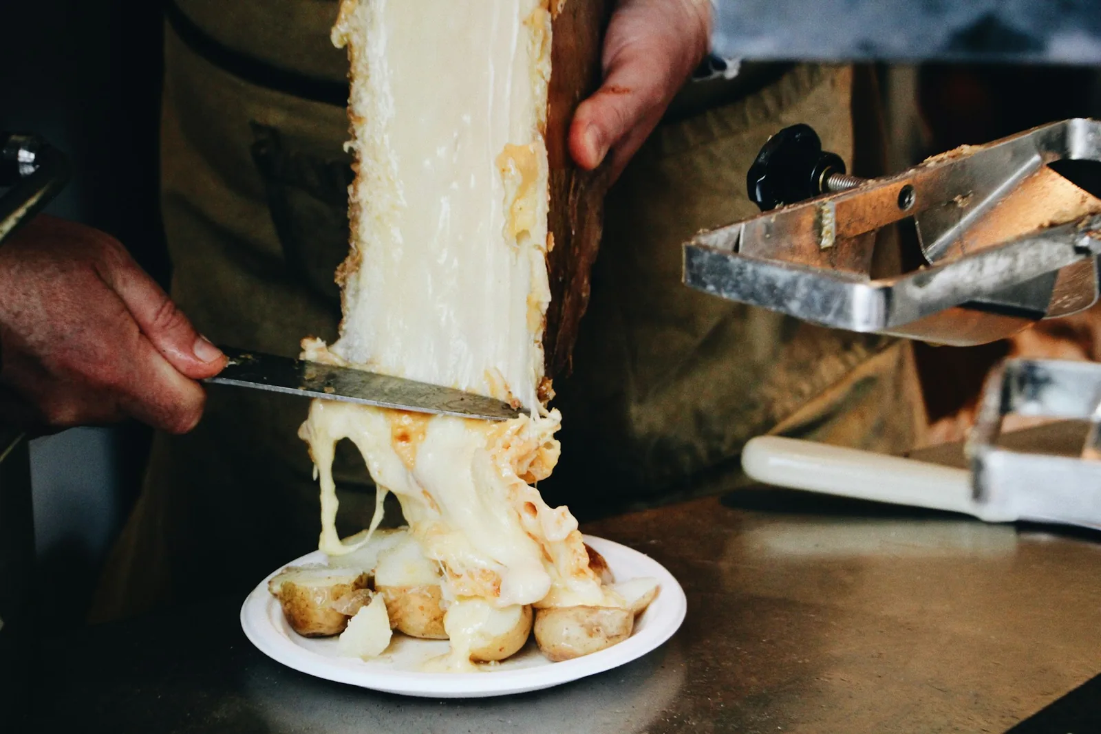 Melted cheese stretching from a fried piece