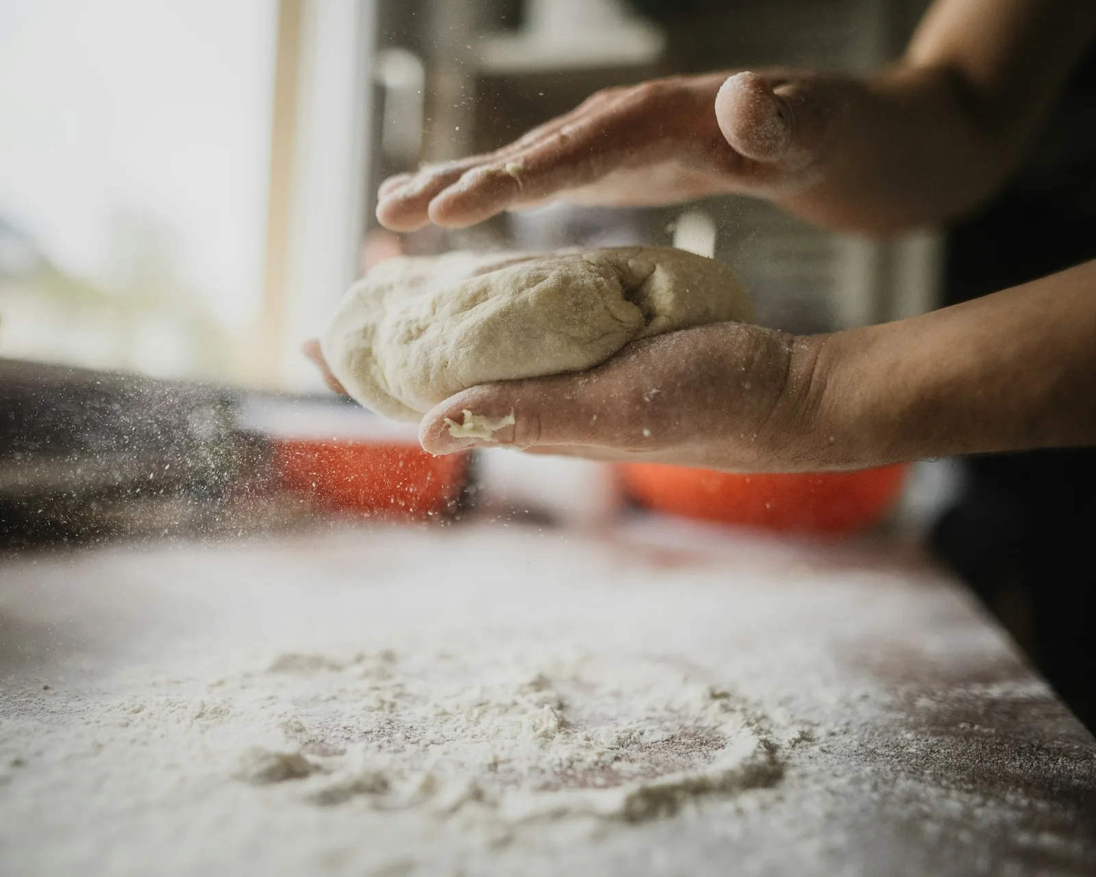 Dough being stretched