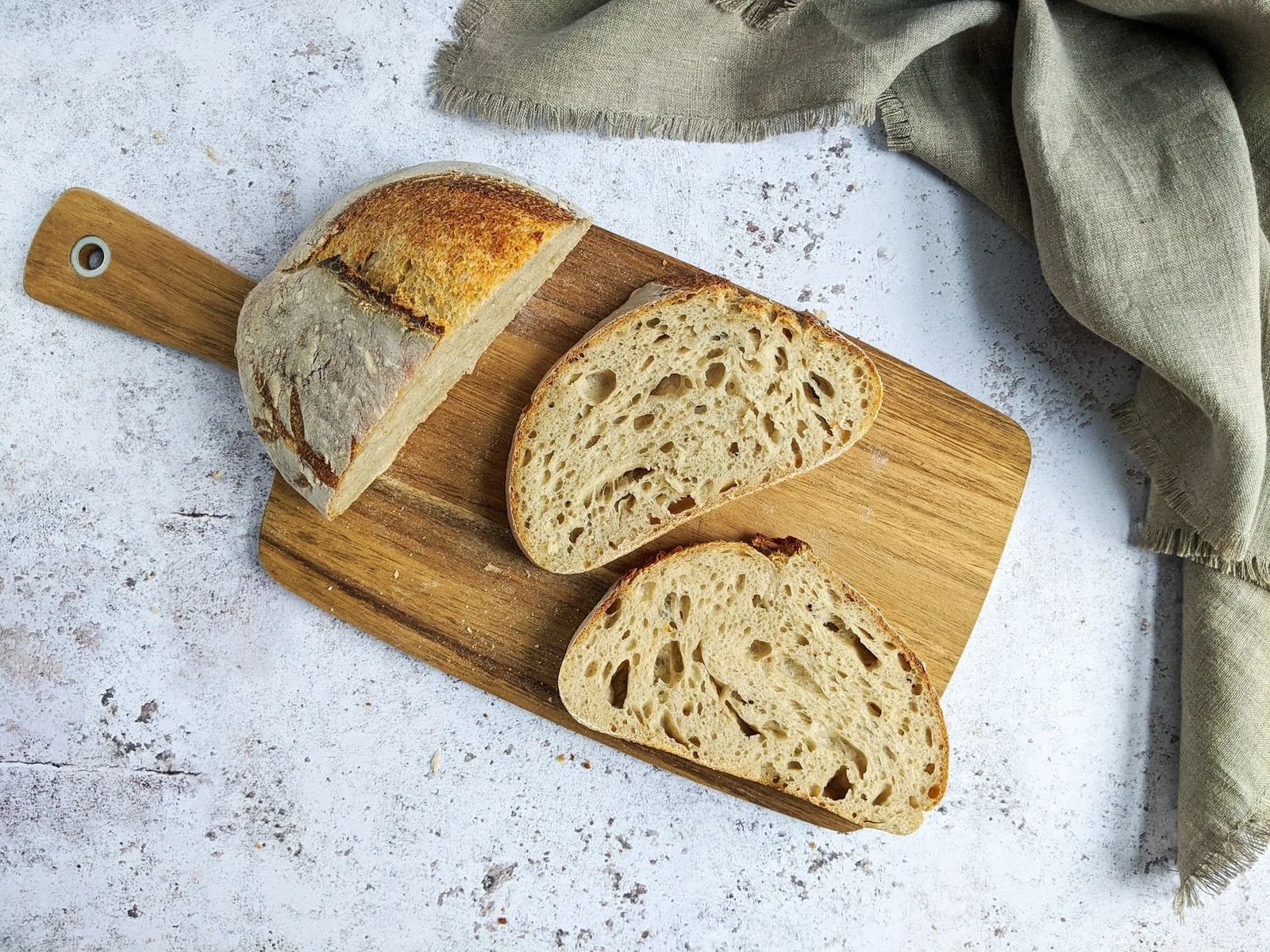 A sliced baguette on a board