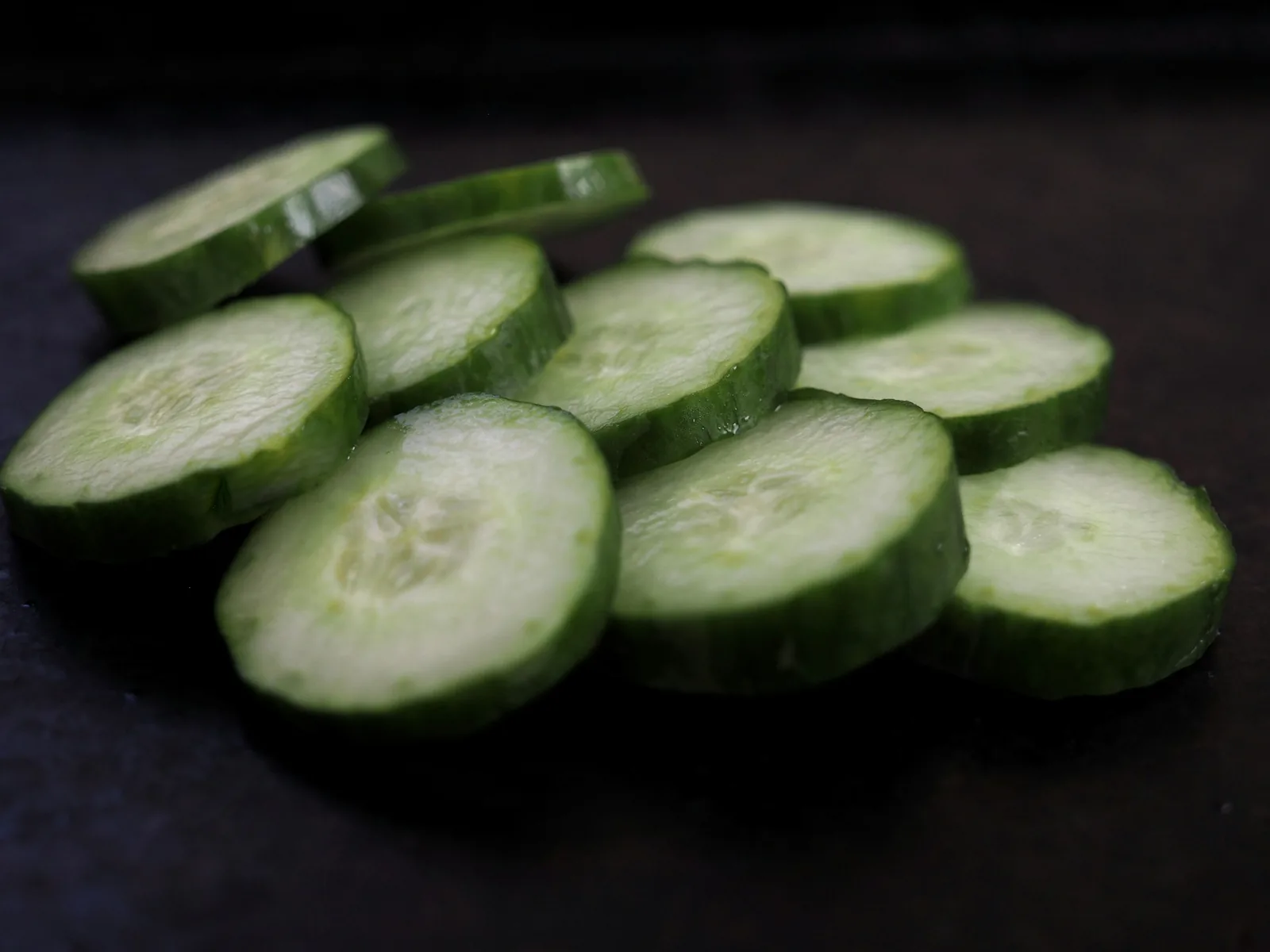 Sliced cucumber on a board