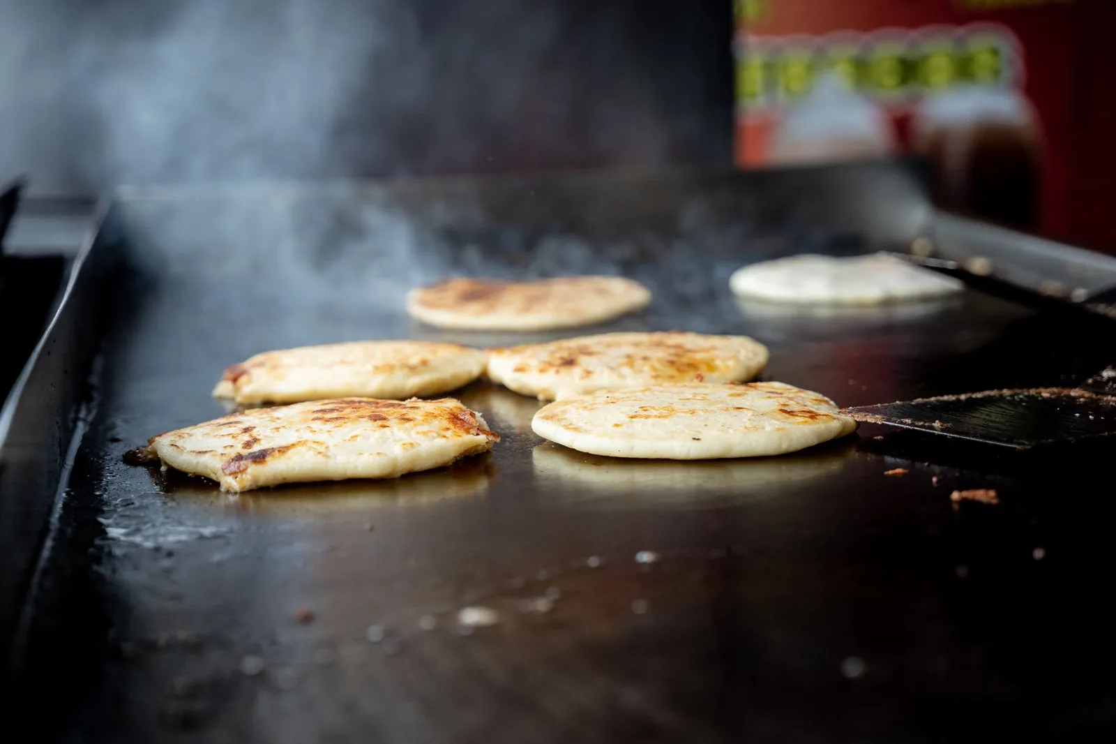 Food cooking on a flat griddle