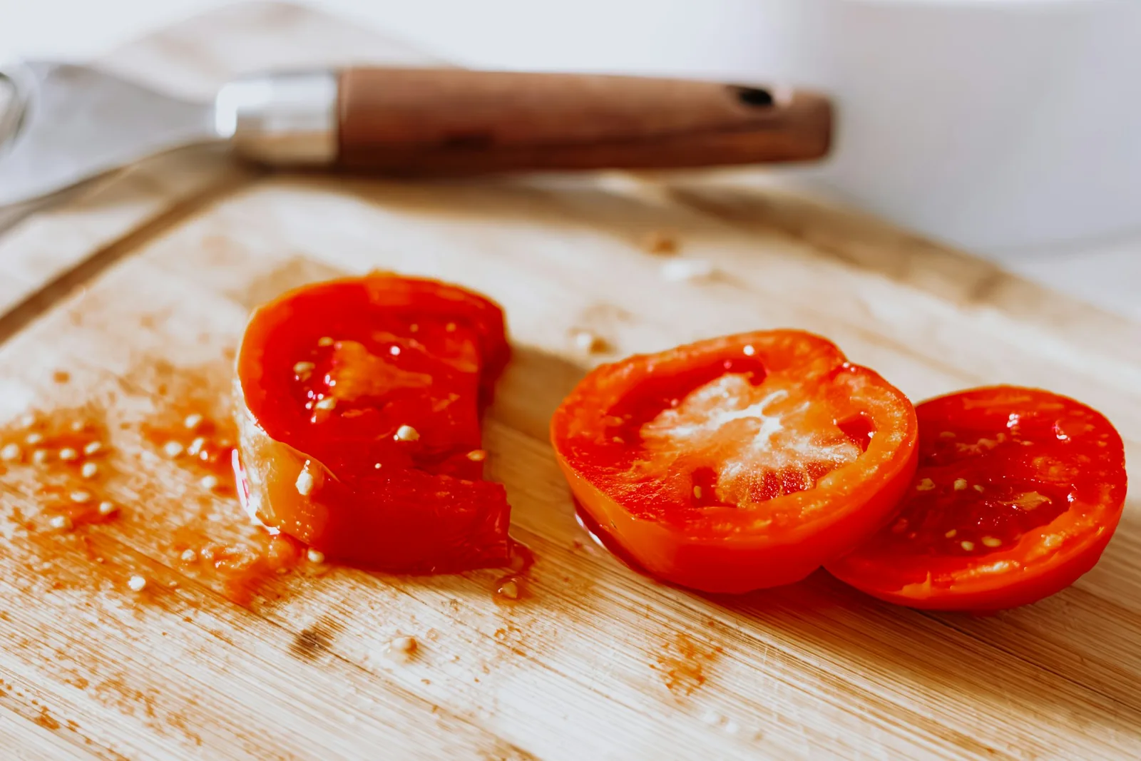 Sliced tomatoes on a board