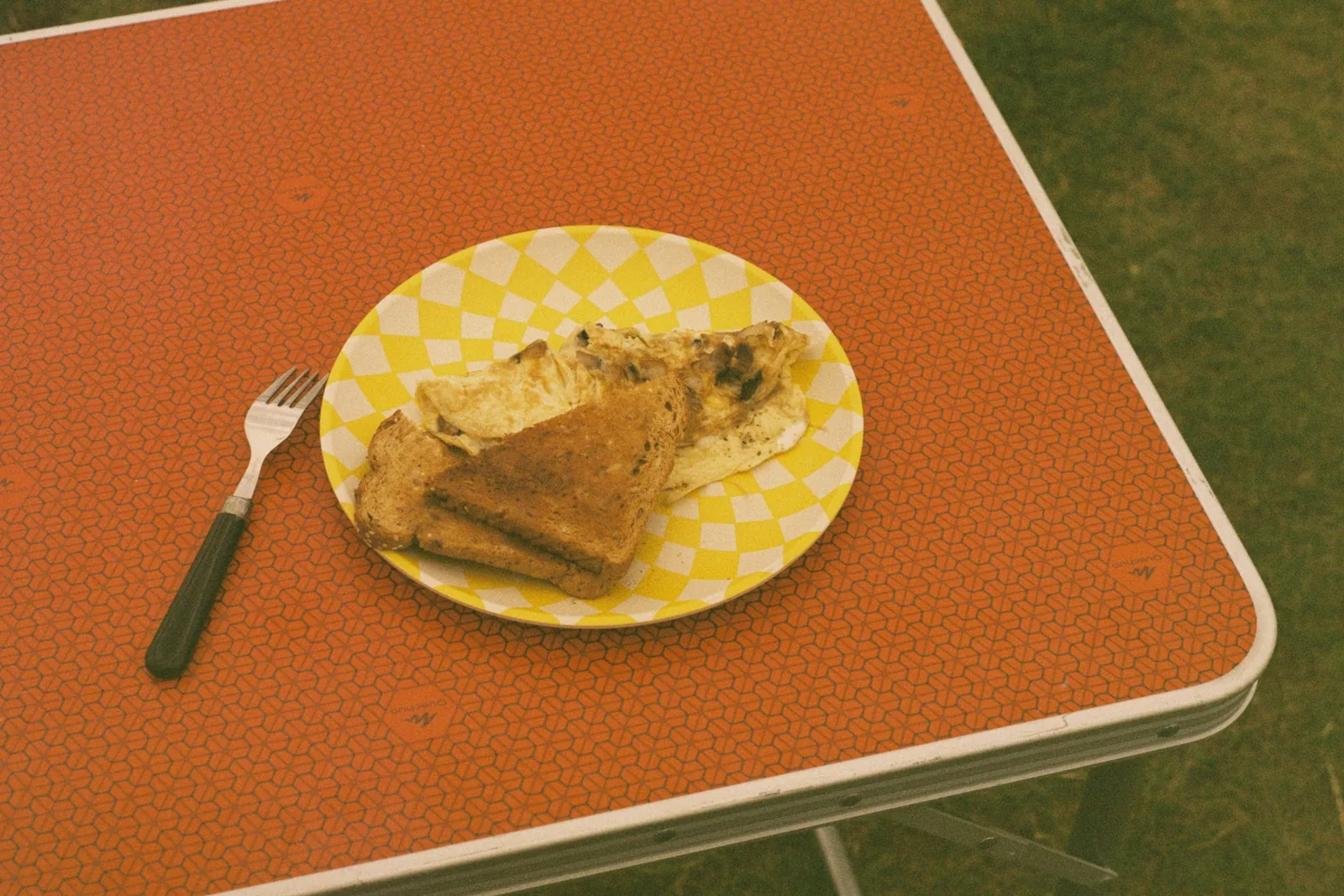 Pizza served with a knife and fork