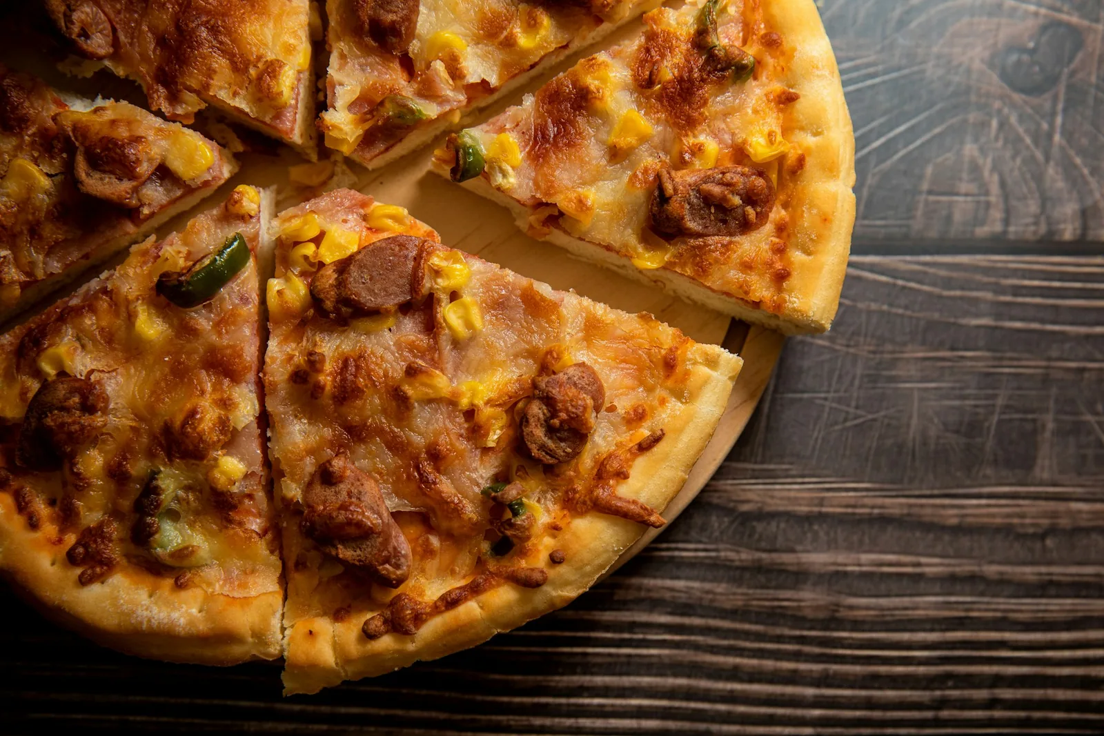 A pizza cut and ready to serve