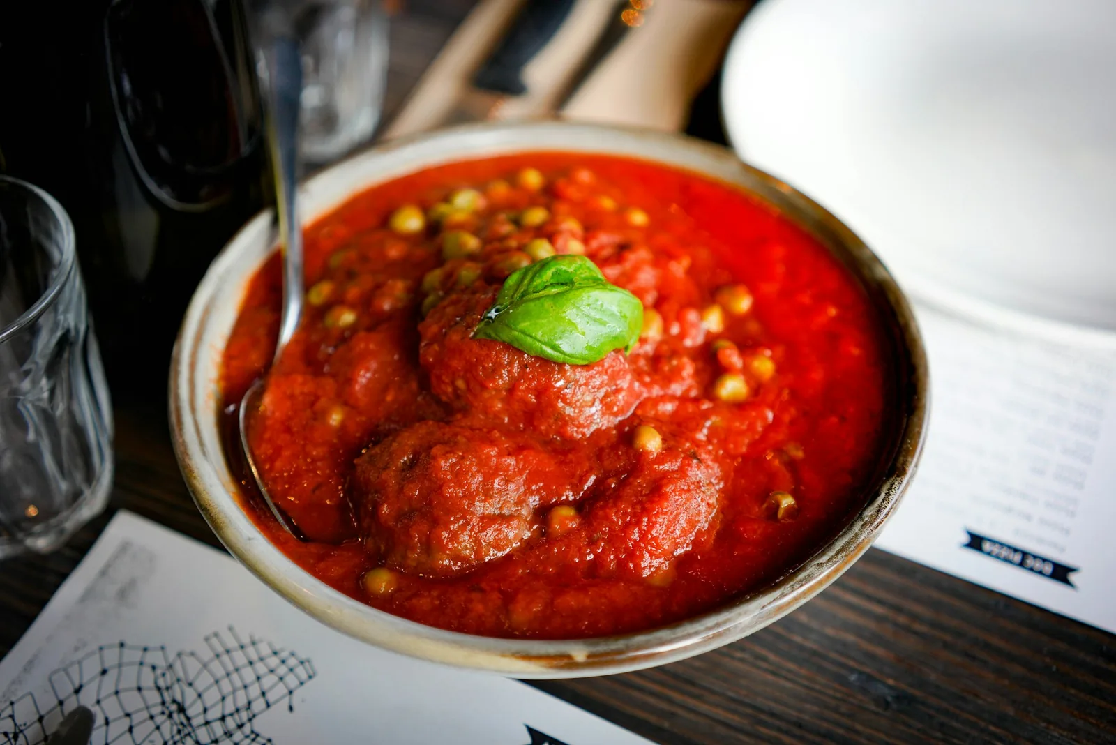 A pot of meatballs in sauce