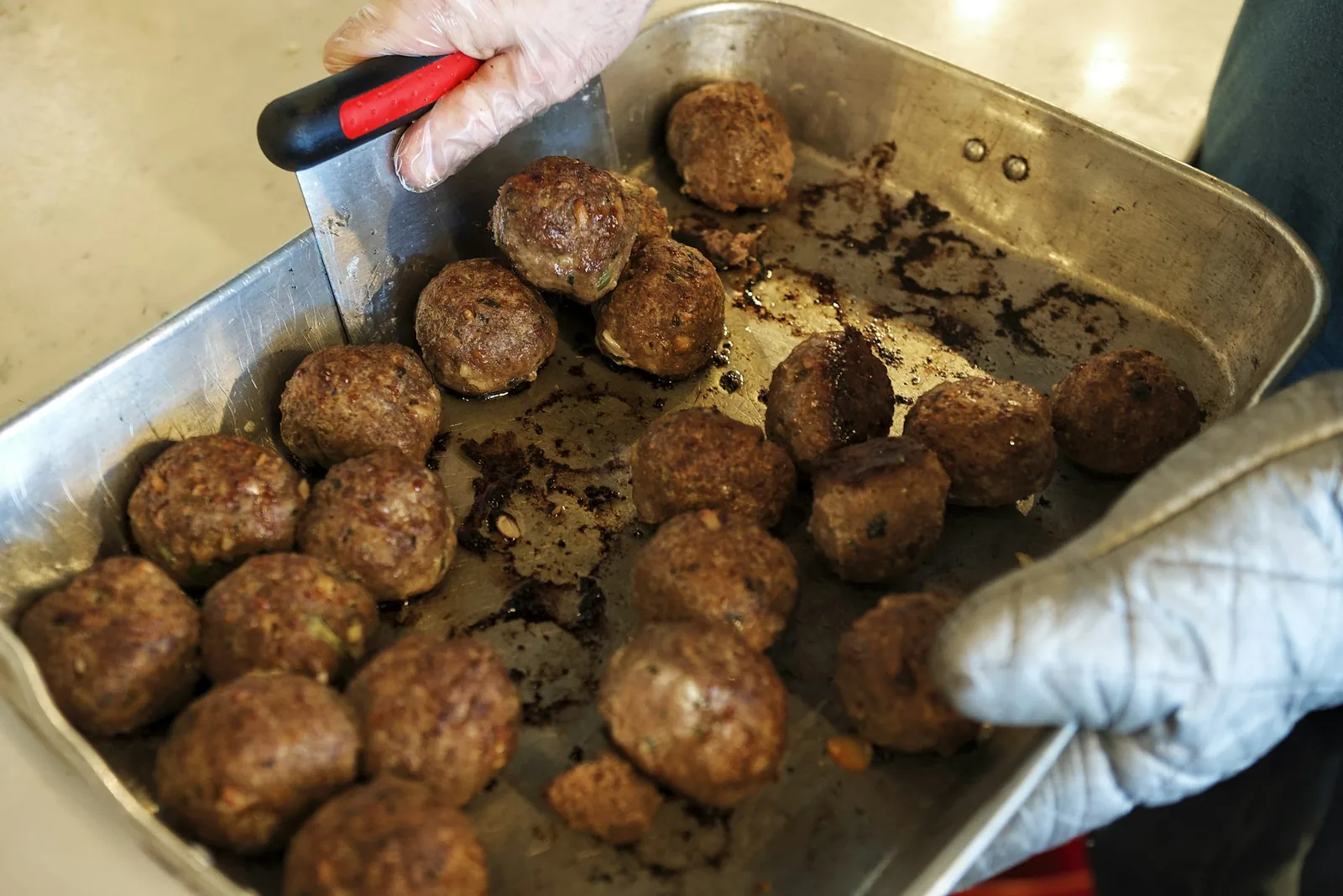 A tray of baked meatballs