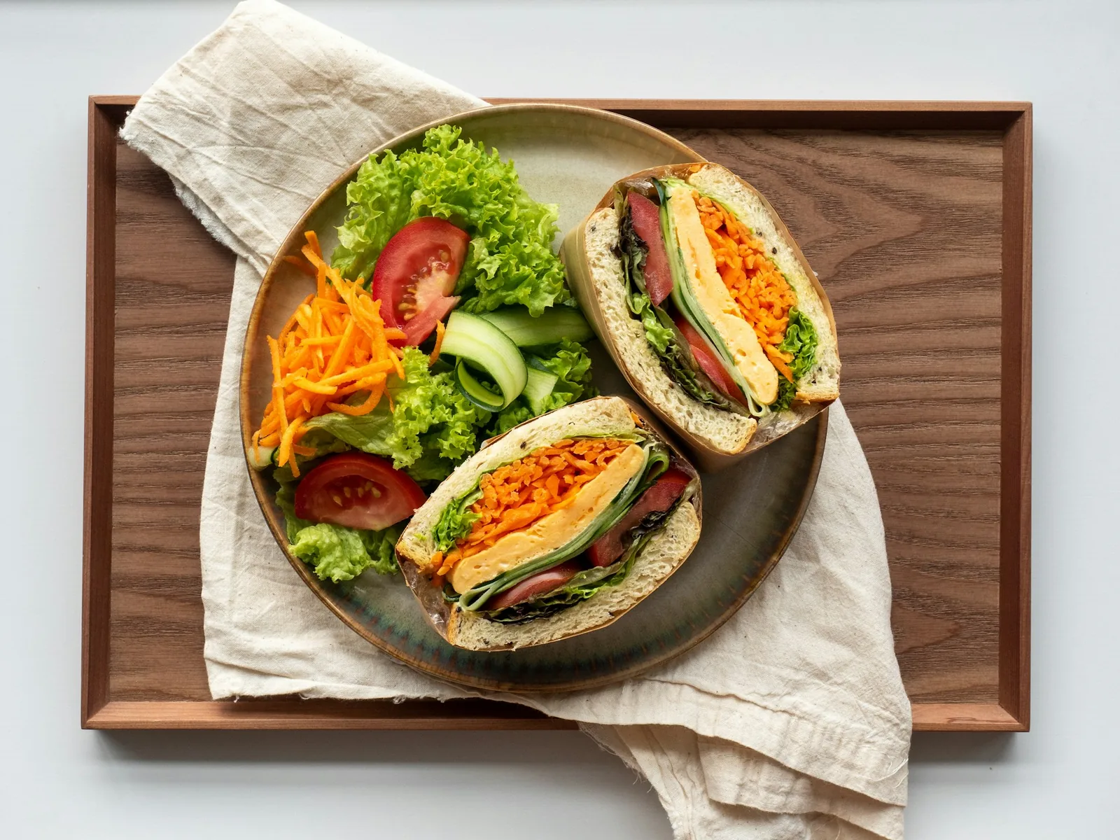 A filled long roll on a plate