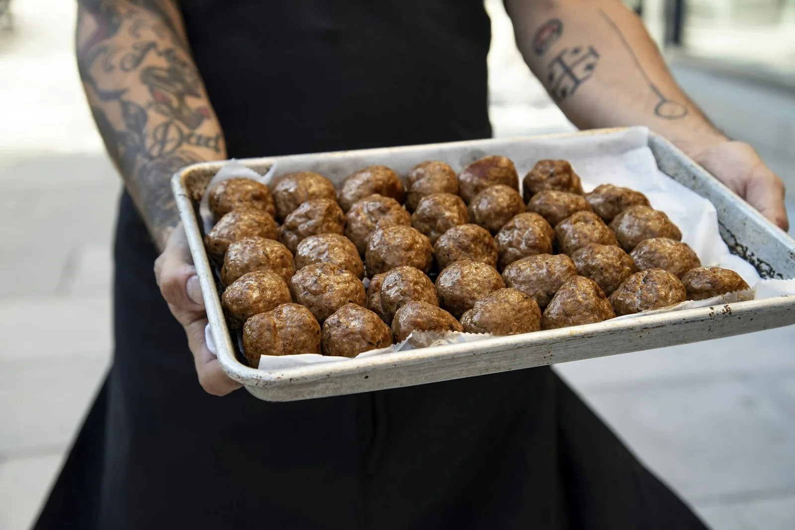 Raw meatballs on a tray