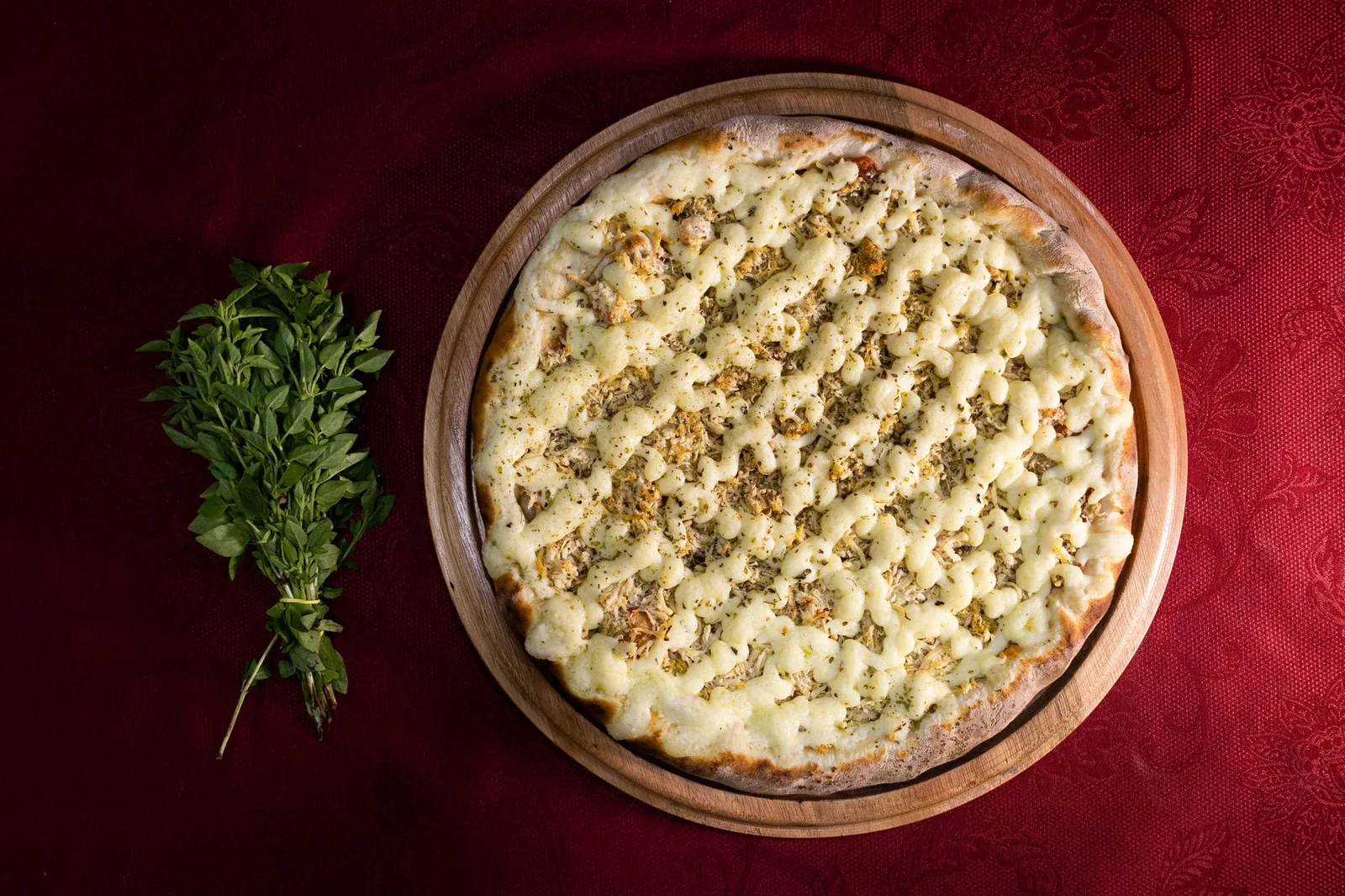 A plain cheese pizza from above