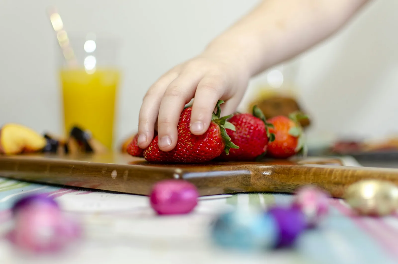 A child's hands at a table
