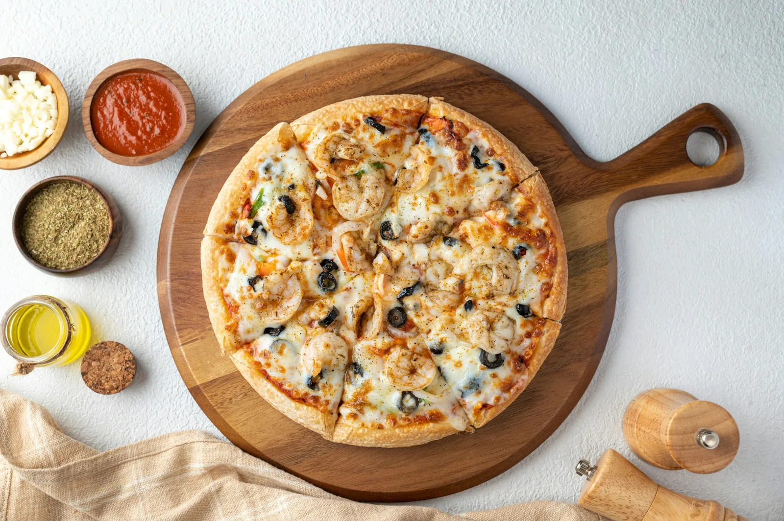 A plain pizza served on a board