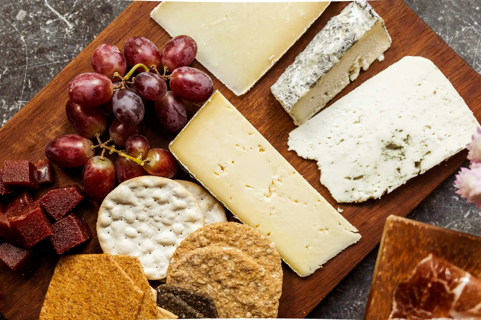 Assorted cheeses on a board