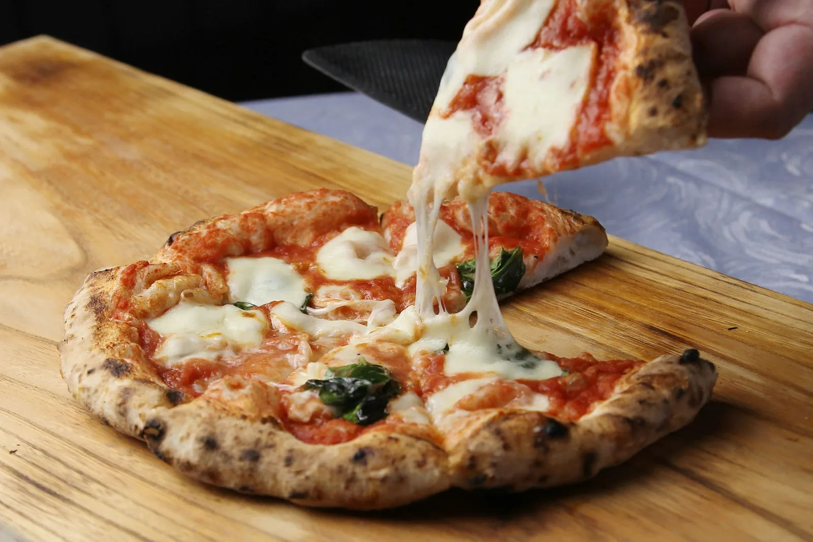 Cheese melting on a pizza