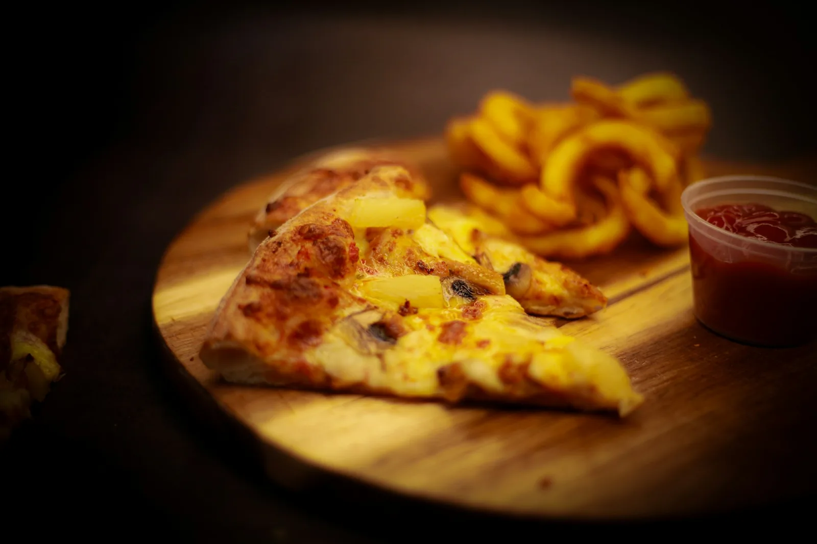 A pizza on a wooden board