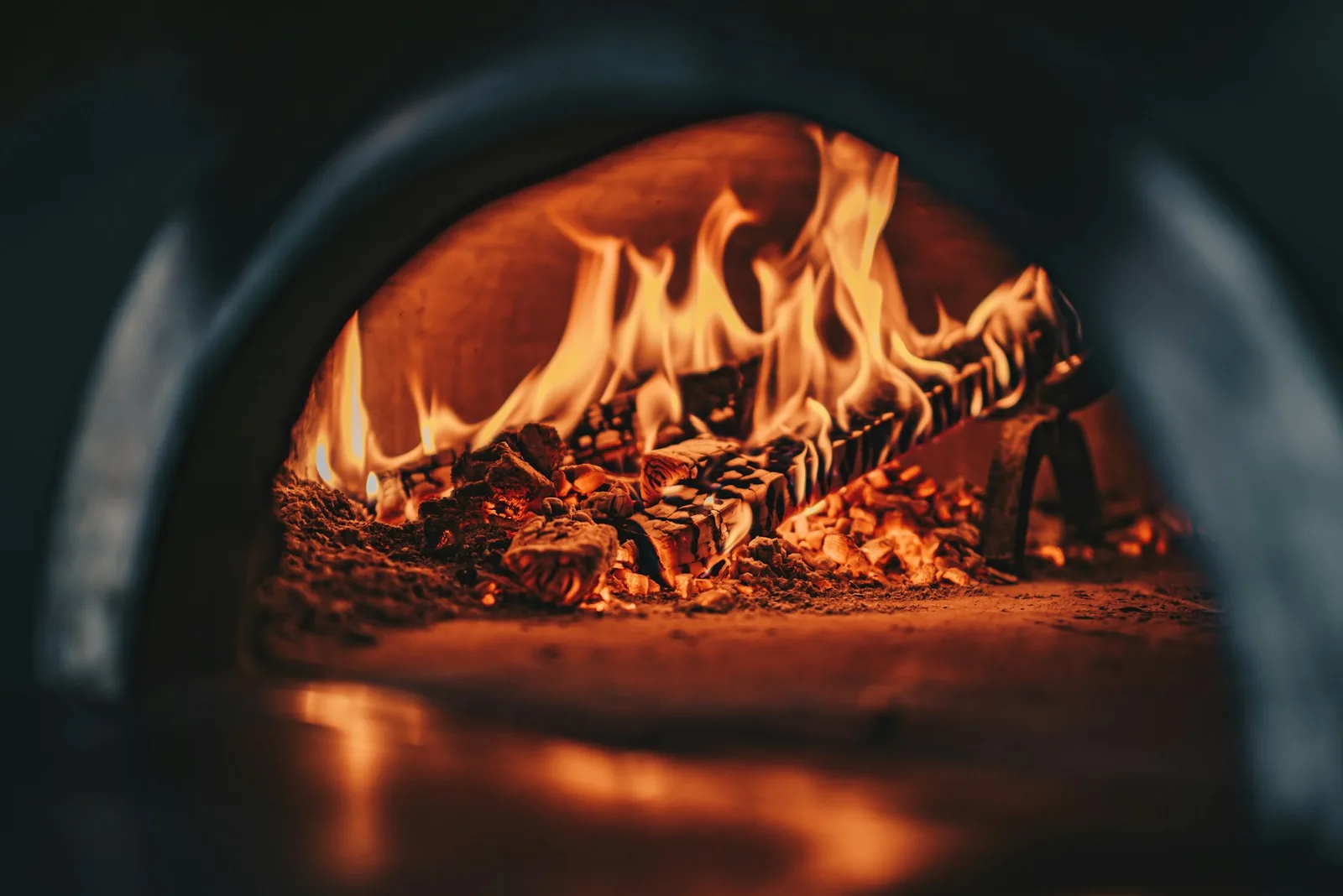 Flames inside a hot pizza oven