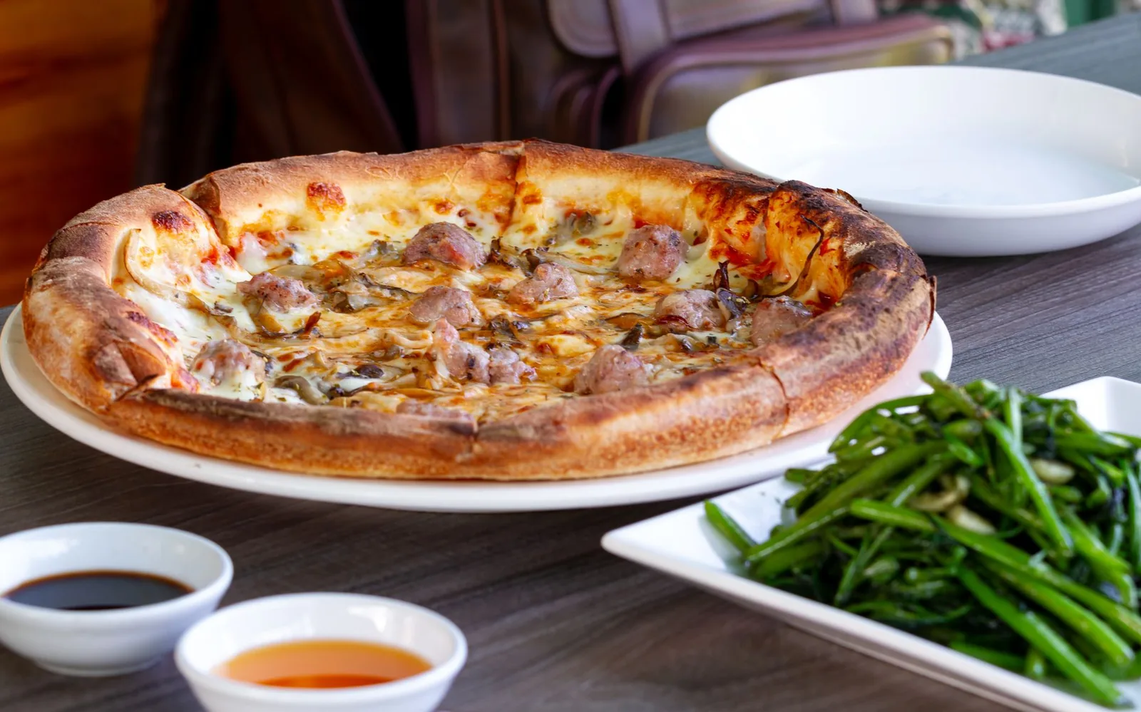 Pizza served with side dishes