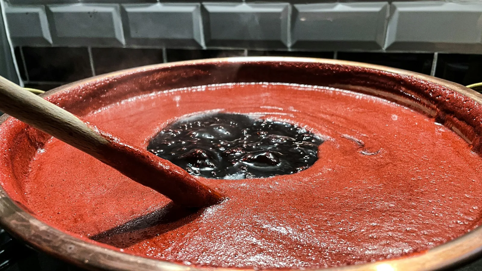 Red sauce simmering in a pot