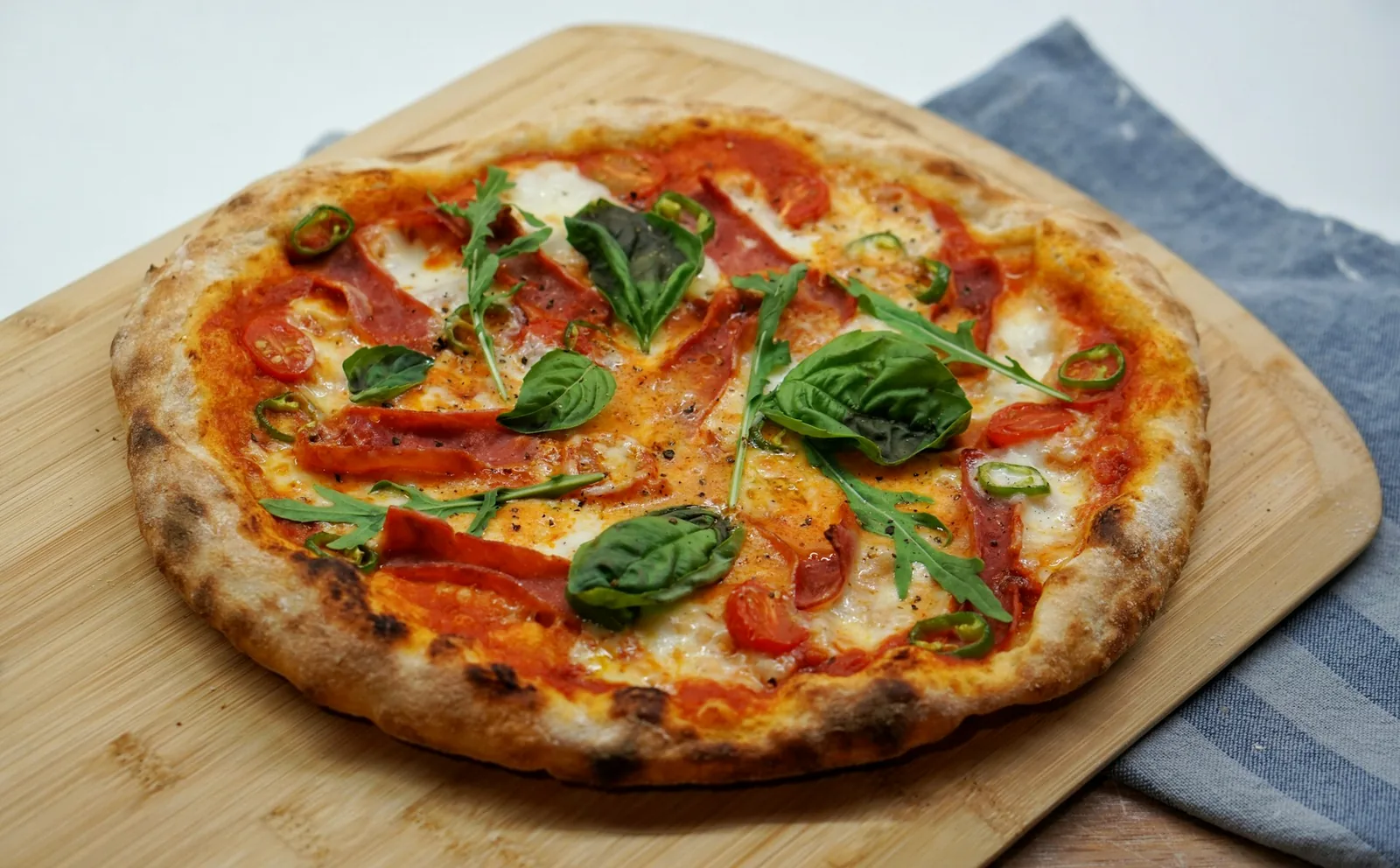 Basil and mozzarella on a pizza