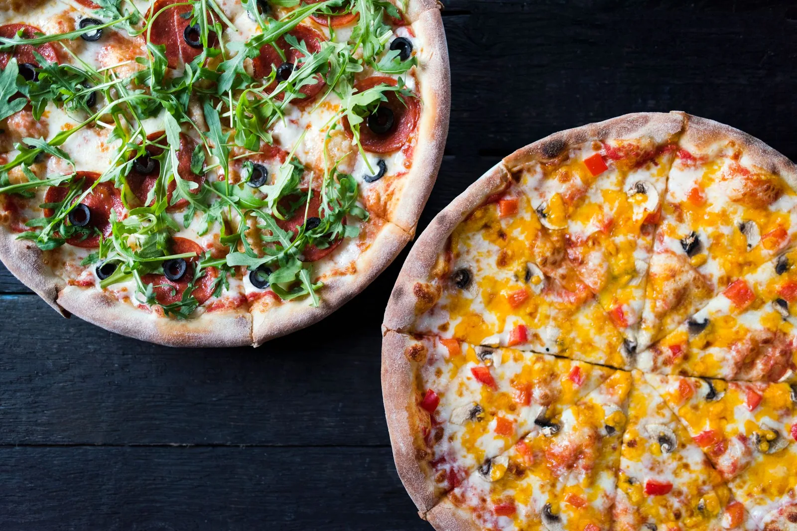 A whole pizza with mixed toppings