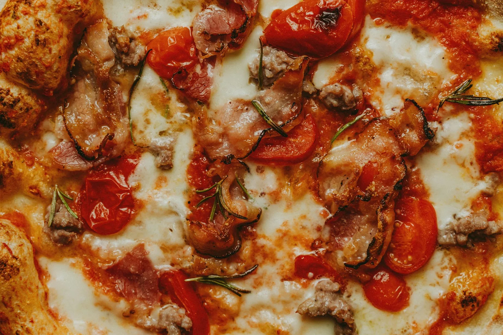 A pizza with a meat topping