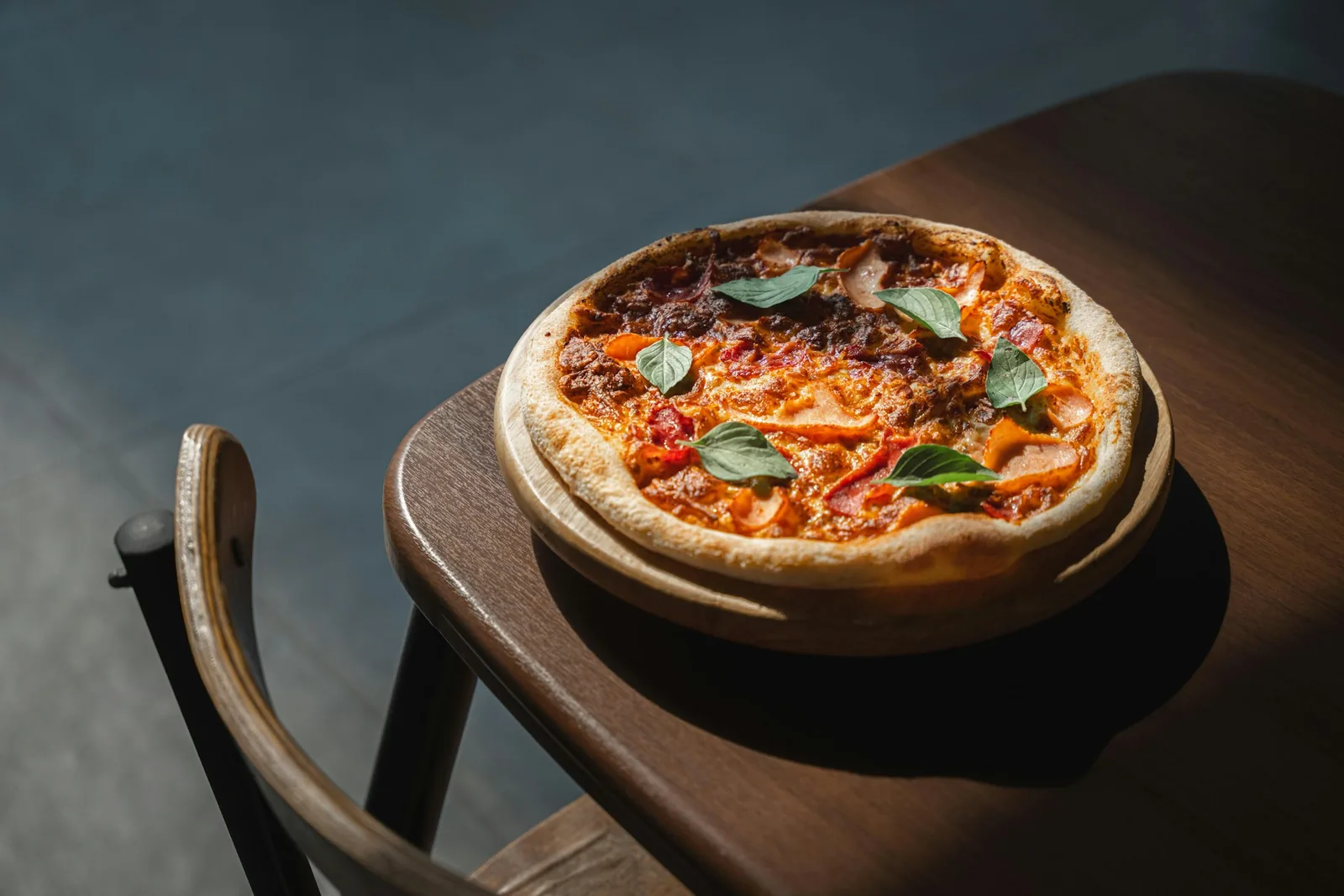 A pizza on a dark background