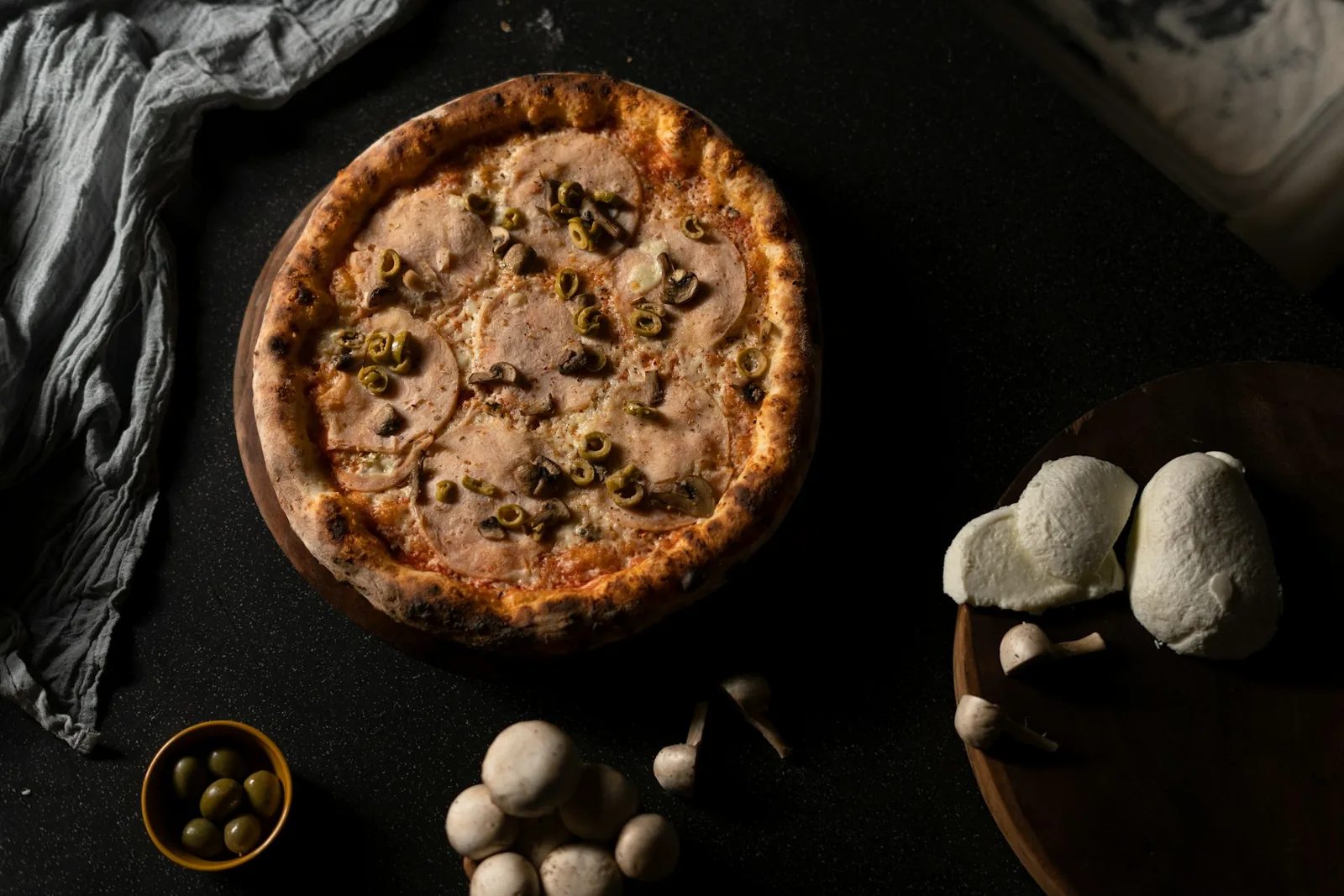 A pizza in warm light