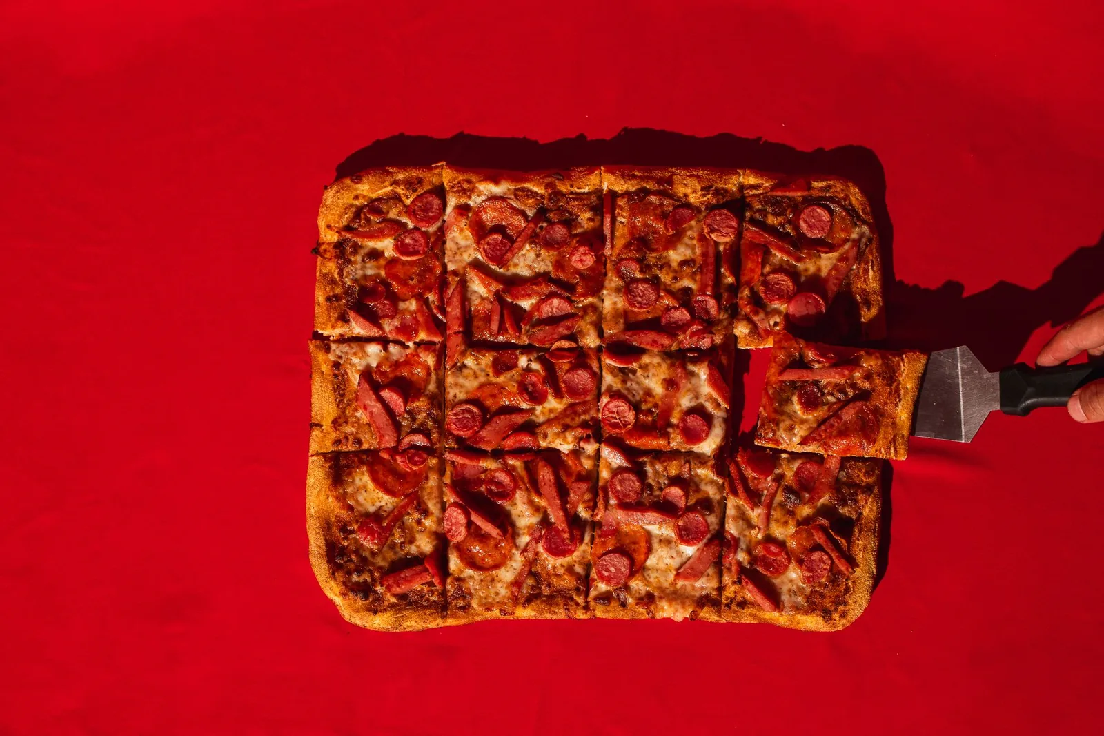 A square-cut pizza with a thick base