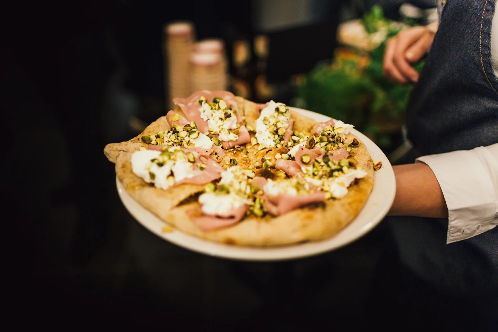 A pizza carried out on a plate