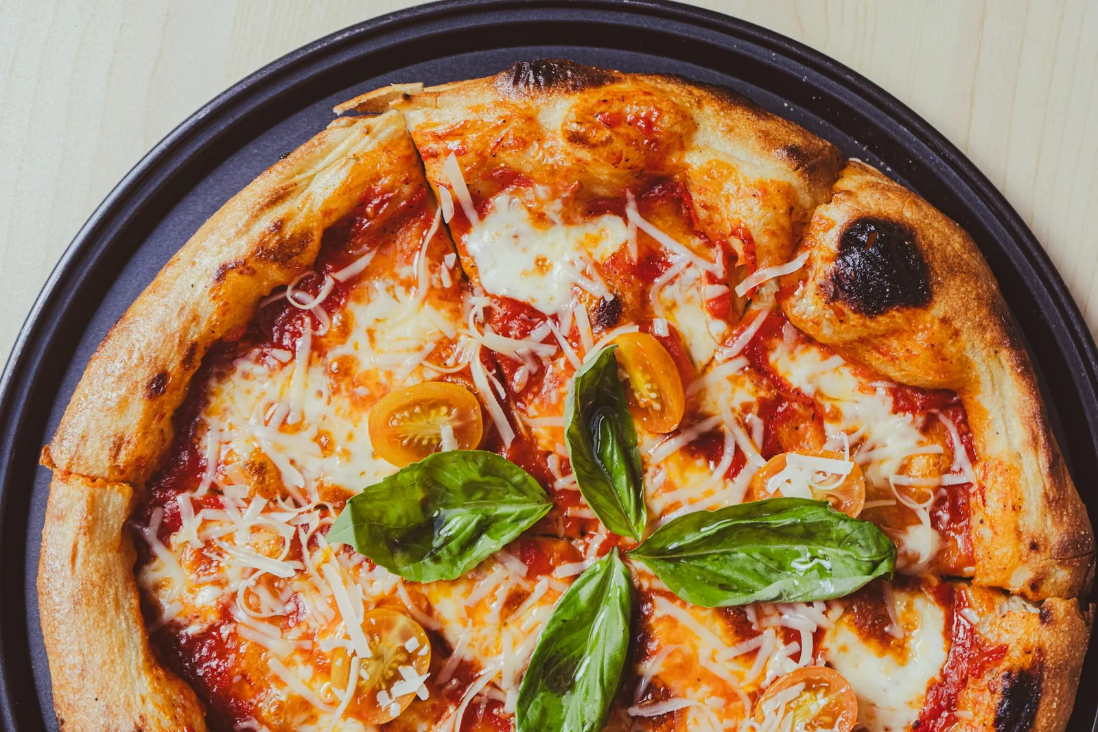 A simple cheese pizza from above