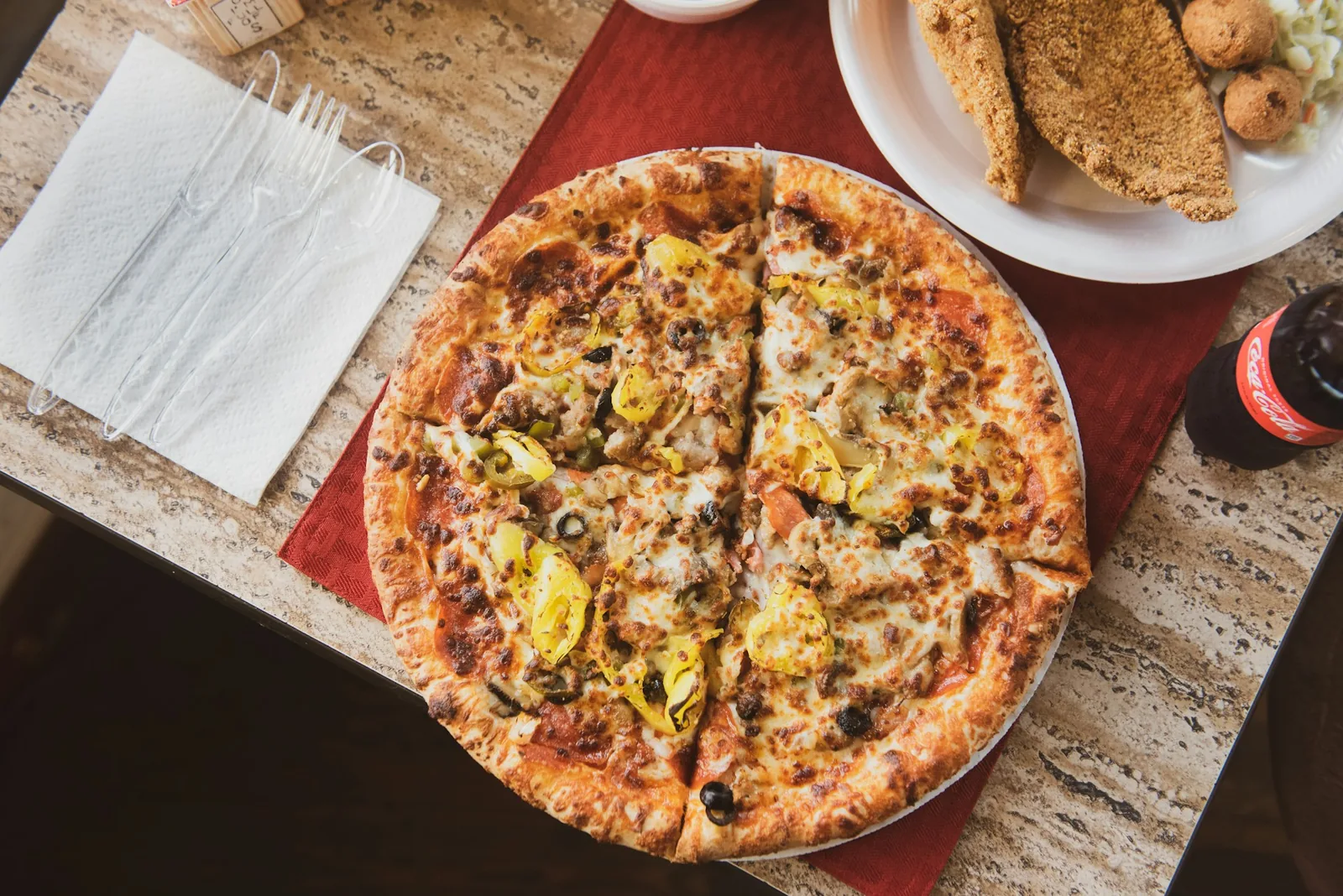 A pizza in warm light
