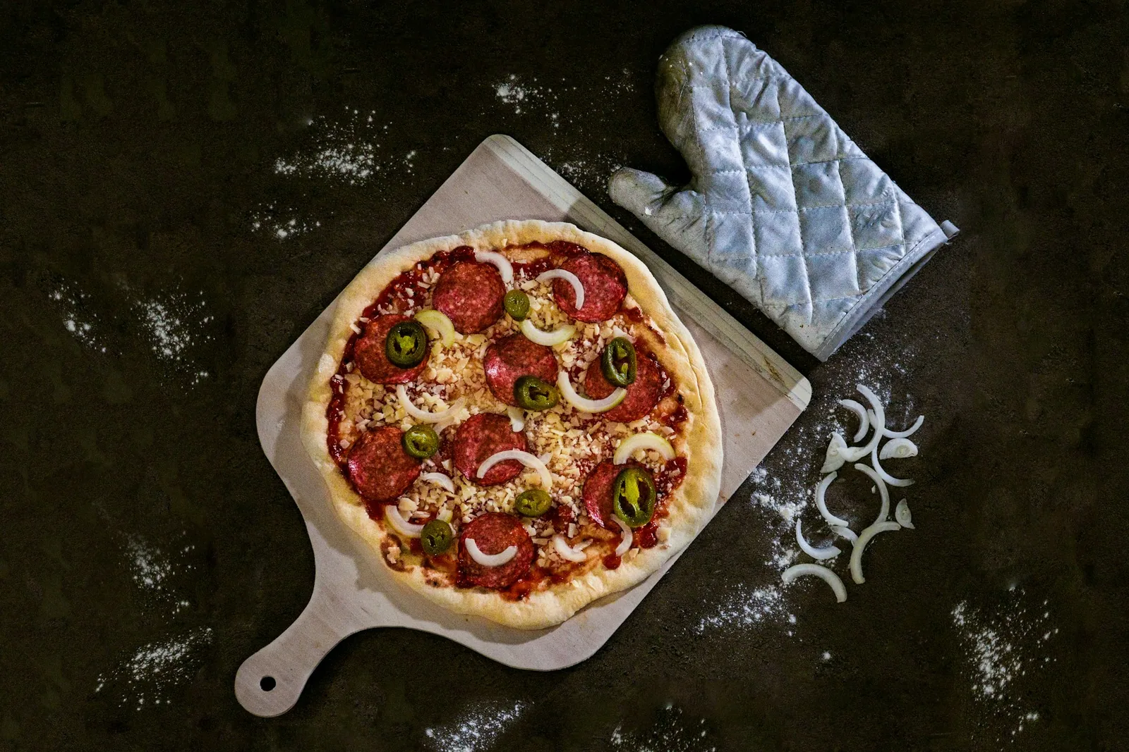 A pizza on a dark background