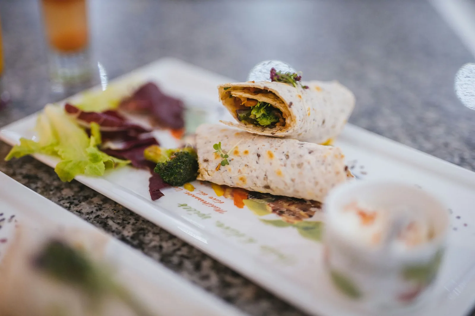 A wrap served on a plate